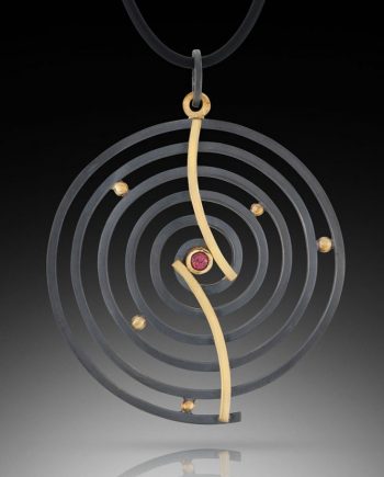 Curved Spiral Pendant by Ilene Schwartz. (Hand-made Silver pendant)